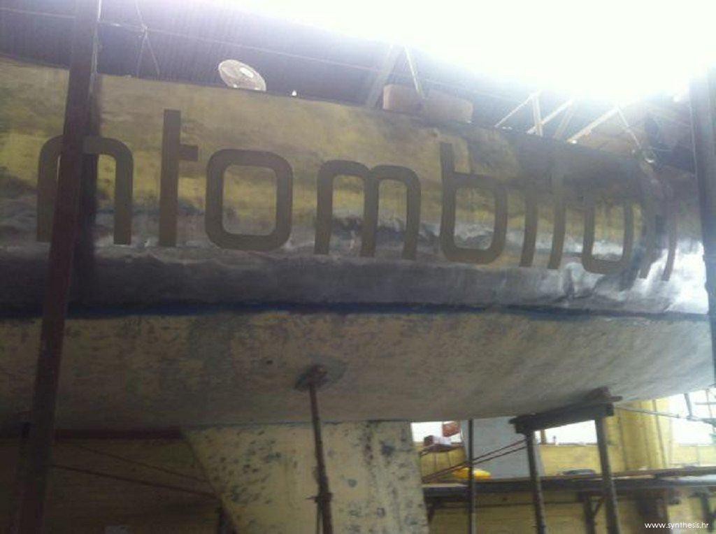 Photos during remodeling - polished aluminum hull with sandblasted name